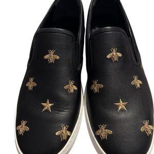 Gucci Black Slip-On Shoes with Gold Embroidery